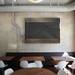 The decor at Lena has a mid-century aesthetic, included Herman Miller lights and wooden sculpture that doubles as a speaker system. Melanie Maxwell I AnnArbor.com